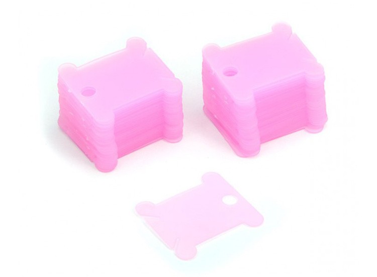 Шпули пластиковые розовые (50 шт.)
